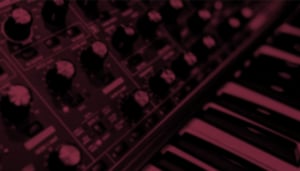 An out of focus closeup photograph of the Moog Sub 37