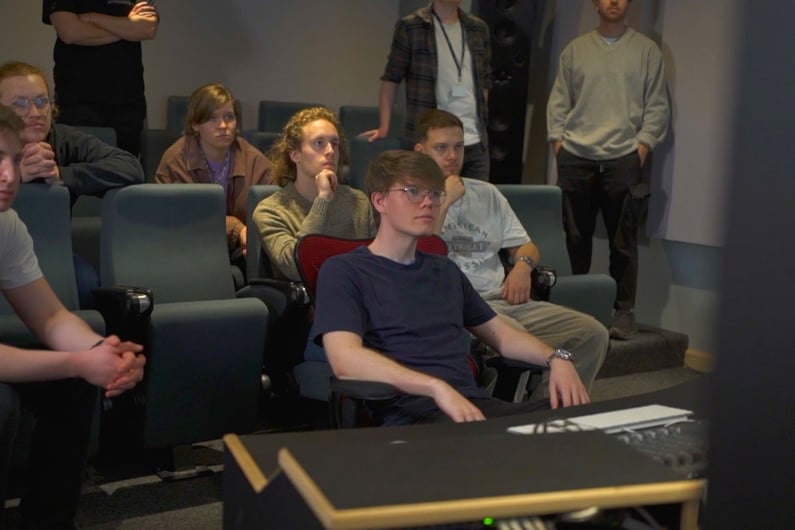 A group of students in the Dolby Atmos Suite in dBs Bristol