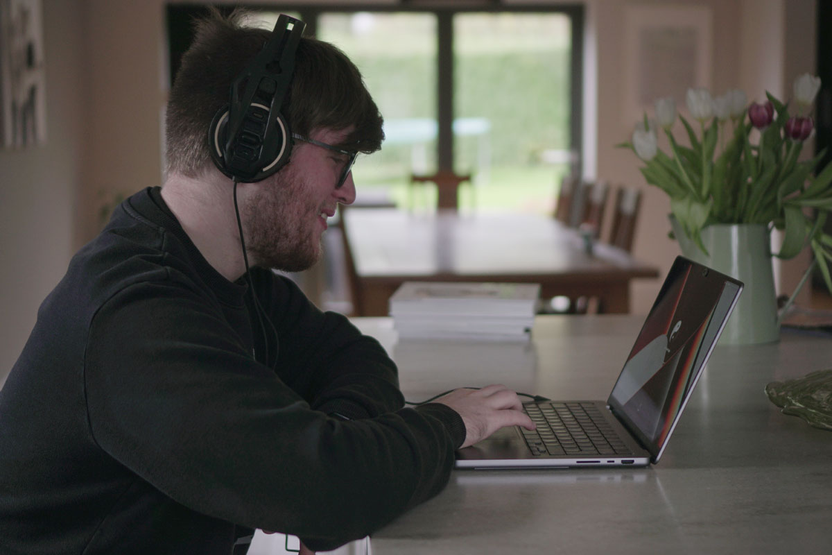 A student studying from home on their laptop