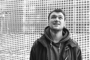 A black and white portrait of Harvey Jones AKA El Choop