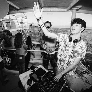 Formula DJing on a boat in the Caribbean