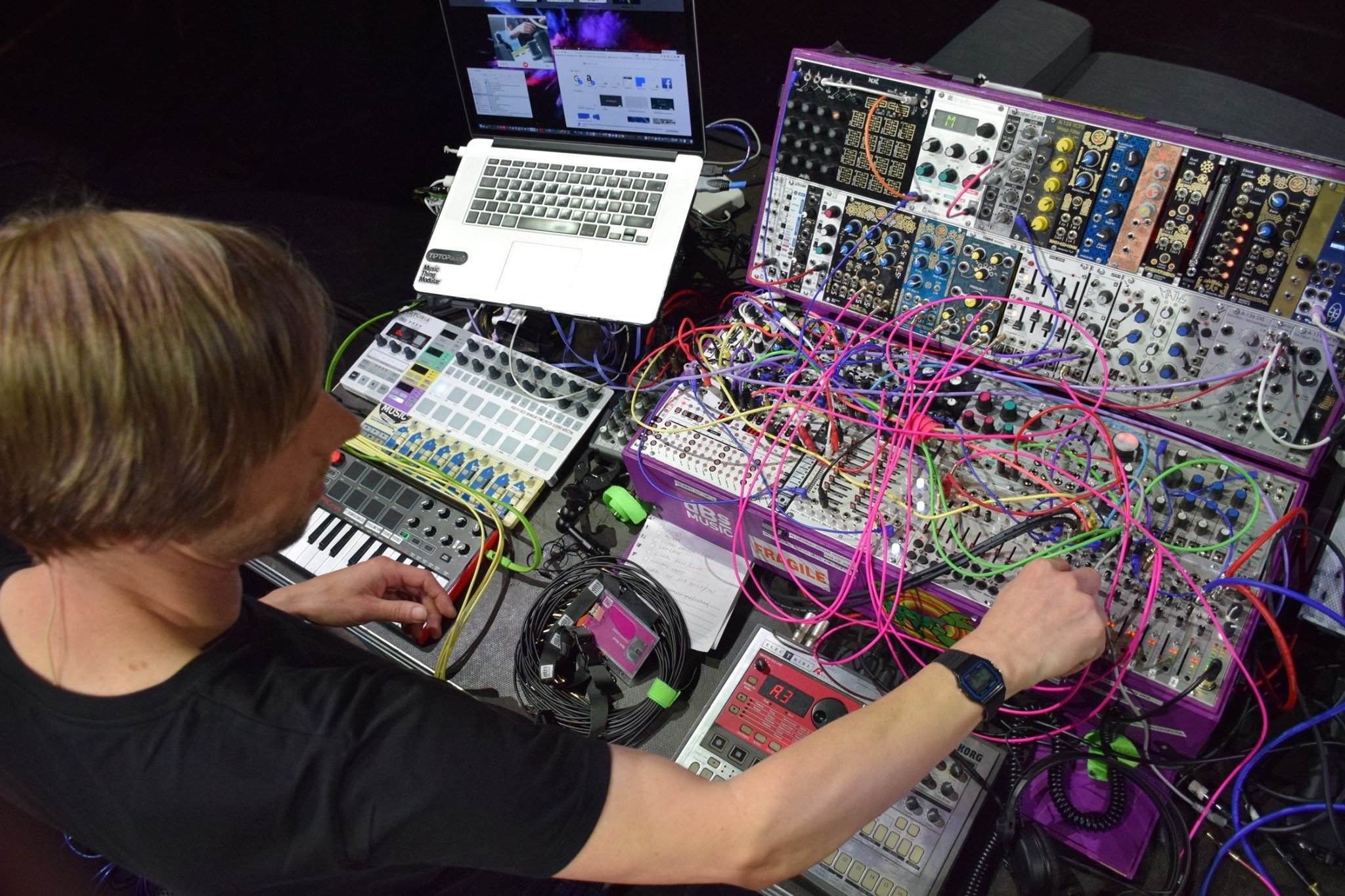 Electronic music production tutor at dBs Institute Matt Ward playing on modular synthesizer