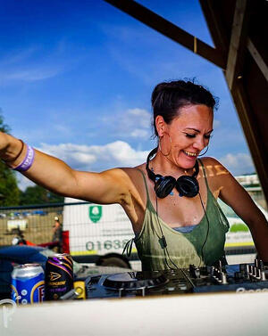 Yvette Chivers AKA DJ MissChivers DJing live using a Pioneer CDJ