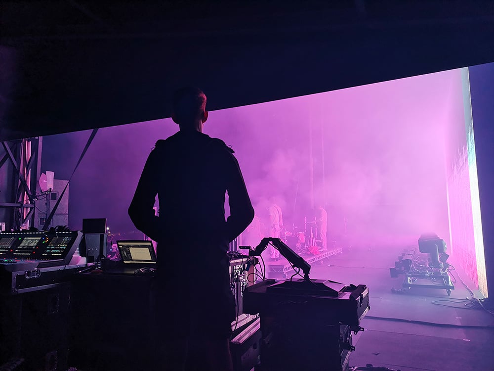 Live sound student working backstage