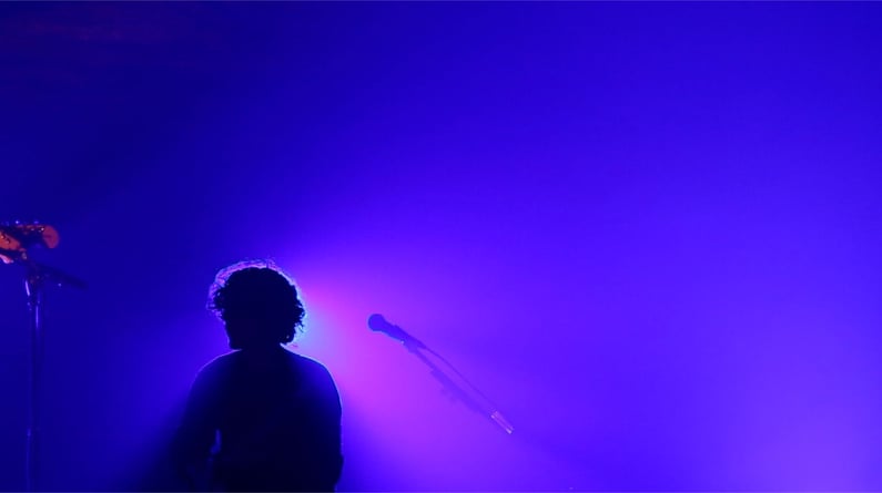 Music artist silhouette on stage