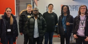 Our game development students, module leader William Sawyerr and Pete Bottomley at White Paper Games