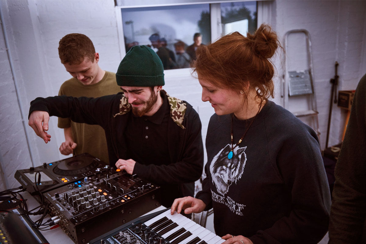 Students performing using CDJ and MIDI controllers