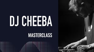 A black and white portrait of DJ Cheeba performing live