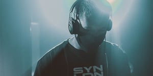 A closeup of Connor Townsend AKA Velocetech DJing live