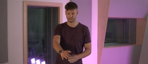Jacob Smith wearing Sonify in a backlit studio live room