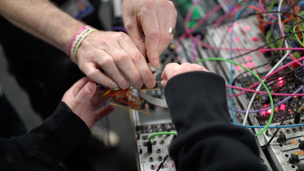 dBs Institute students and staff working on modular synth