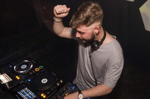 A shot of Marco Strous DJing live using CDJ controllers